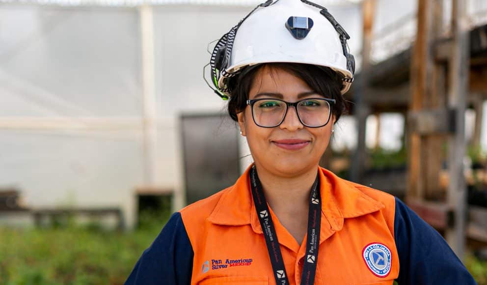 Pan American Silver Female Employee in Hard Hat from Mexico Looking into Camera