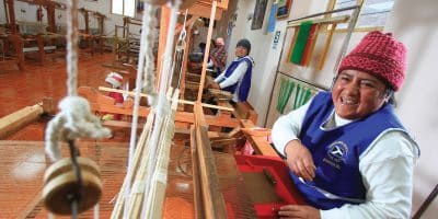 Women from Community Working at Loom