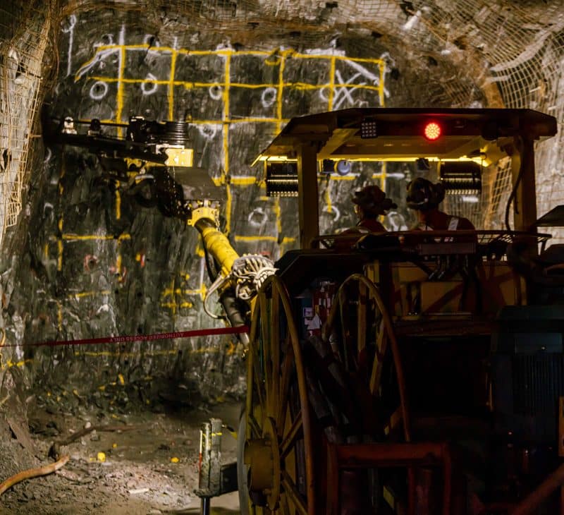 Pan American Silver Employees Working with Heavy Machinery in Mine