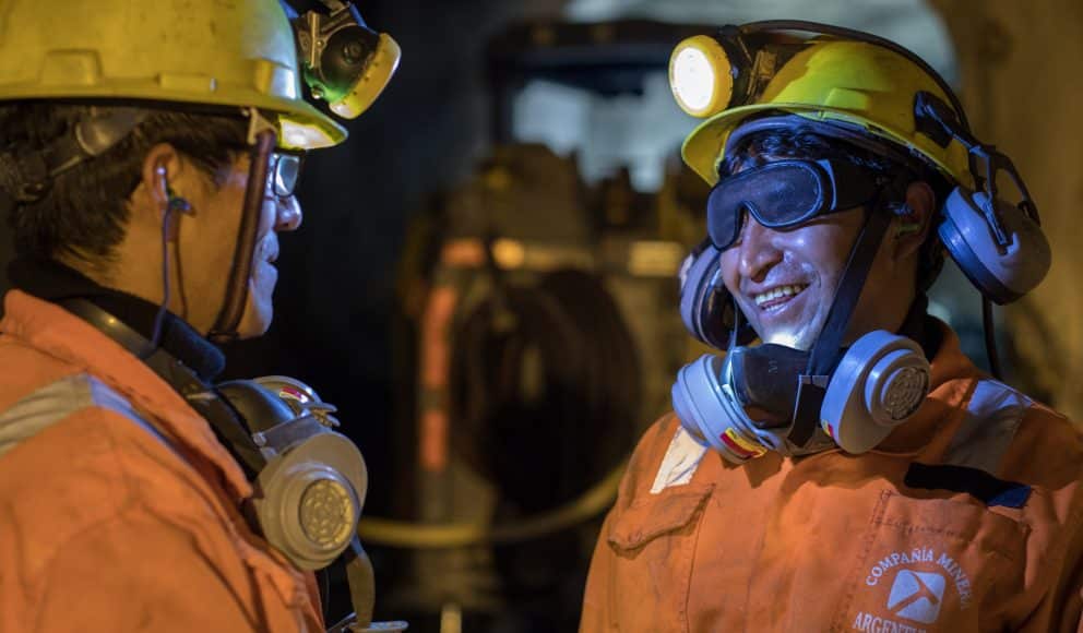 Two Pan American Silver Mine Employees Having a Conversation